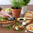 Load image into Gallery viewer, GARLIC &amp; HERB INFUSED OLIVE OIL : 250ml
